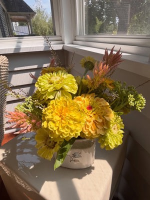 Bouquet in thrifted china creamer pitcher