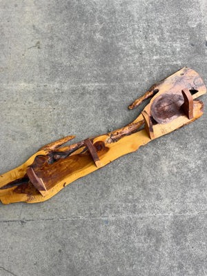 Natural wood slab wall rack