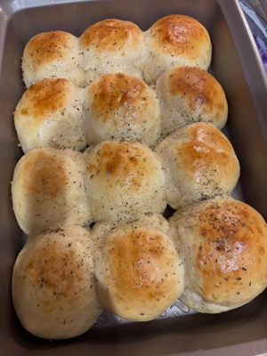 Homemade rolls, garlic knots and pizza crust