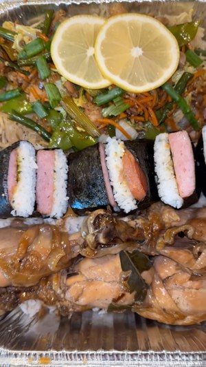 Pancit, musubi, rice and chicken adobo plate