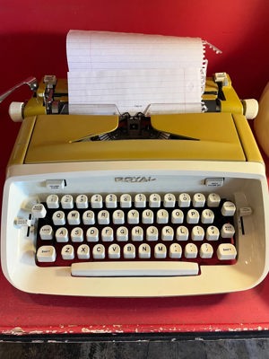1960s Royal Safari portable typewriter, golden yellow